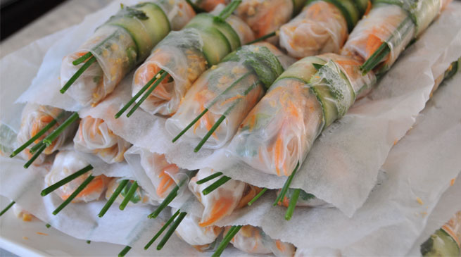 Vietnamese rice paper rolls with coconut poached chicken.